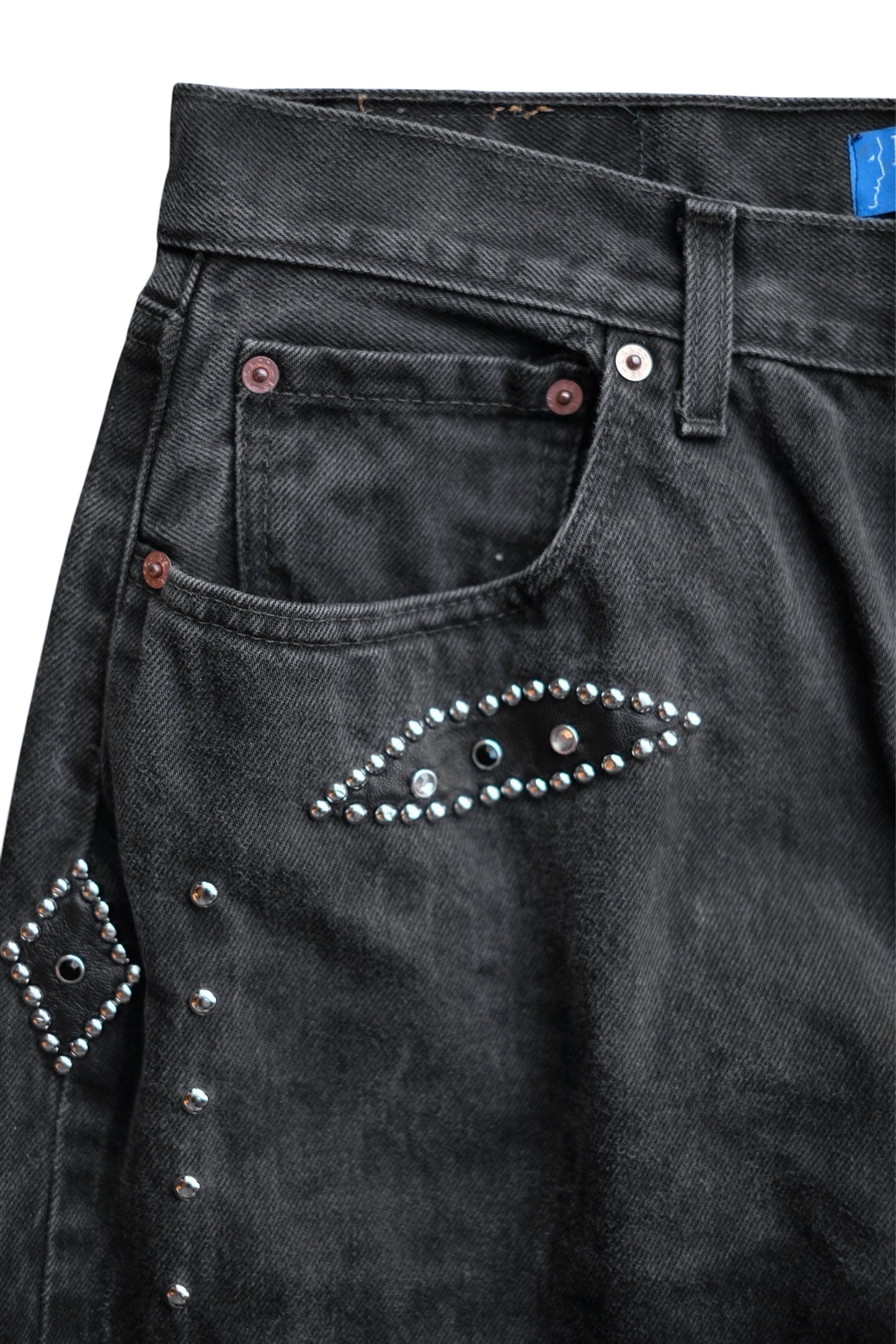 LEATHER STUDS DENIM PANTS