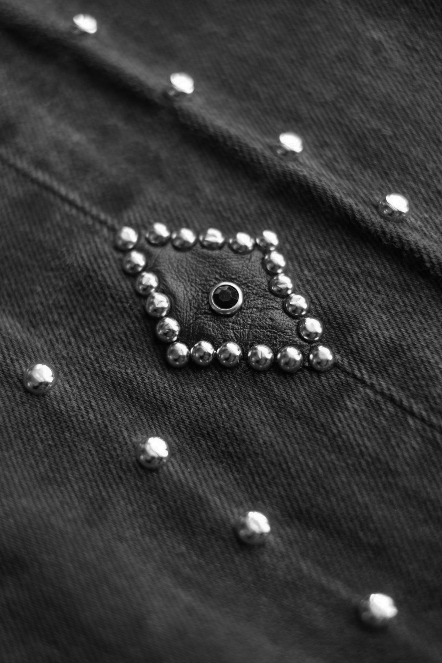 LEATHER STUDS DENIM PANTS