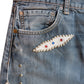 LEATHER STUDS DENIM PANTS