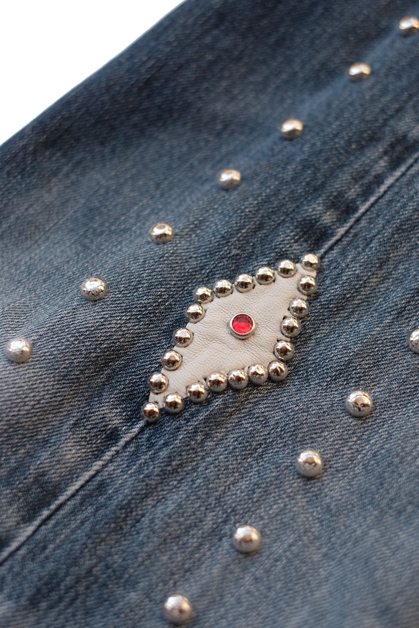 LEATHER STUDS DENIM PANTS