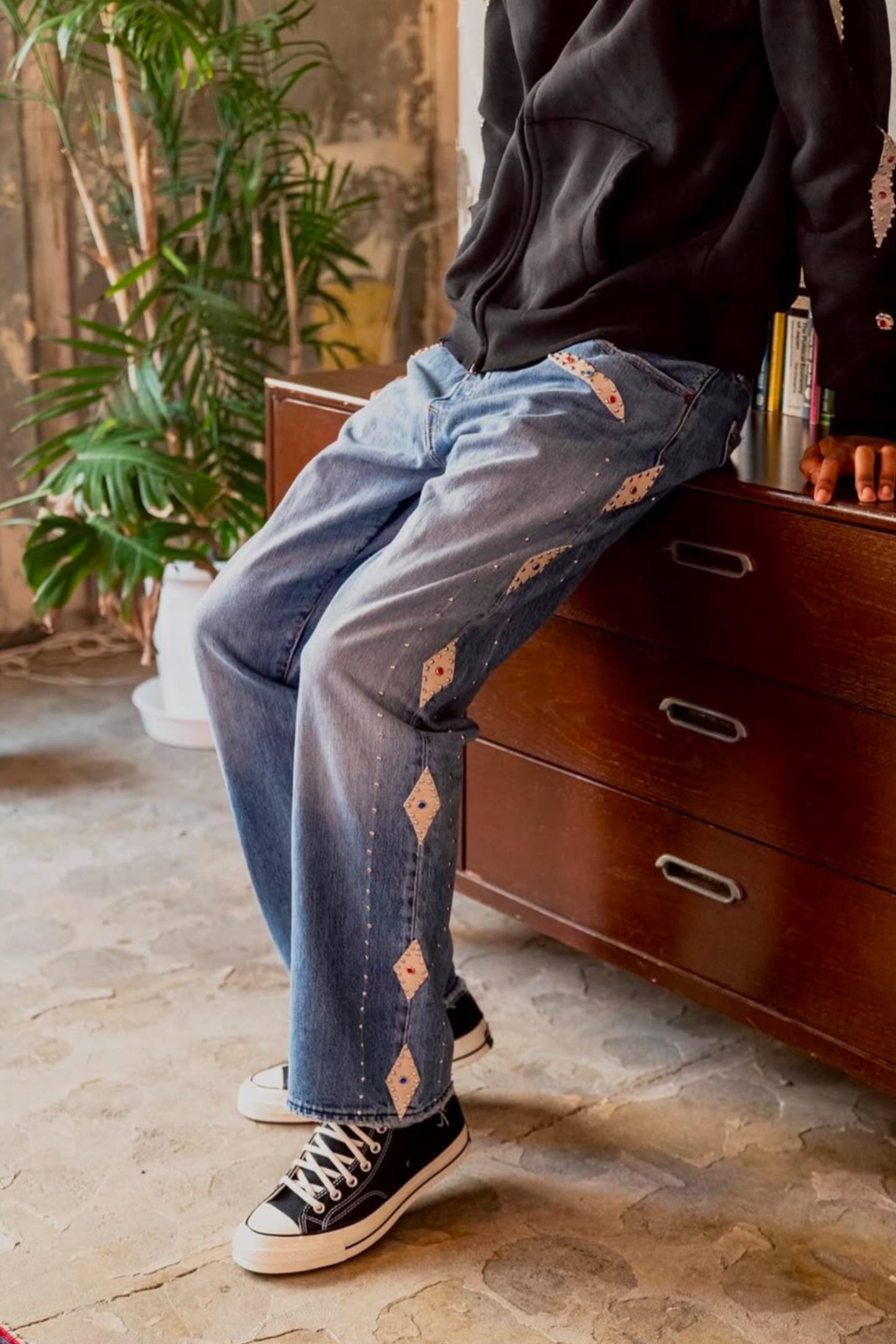 LEATHER STUDS DENIM PANTS