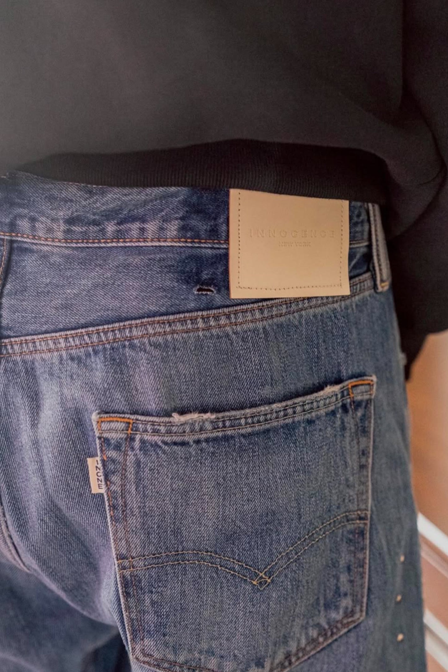 LEATHER STUDS DENIM PANTS